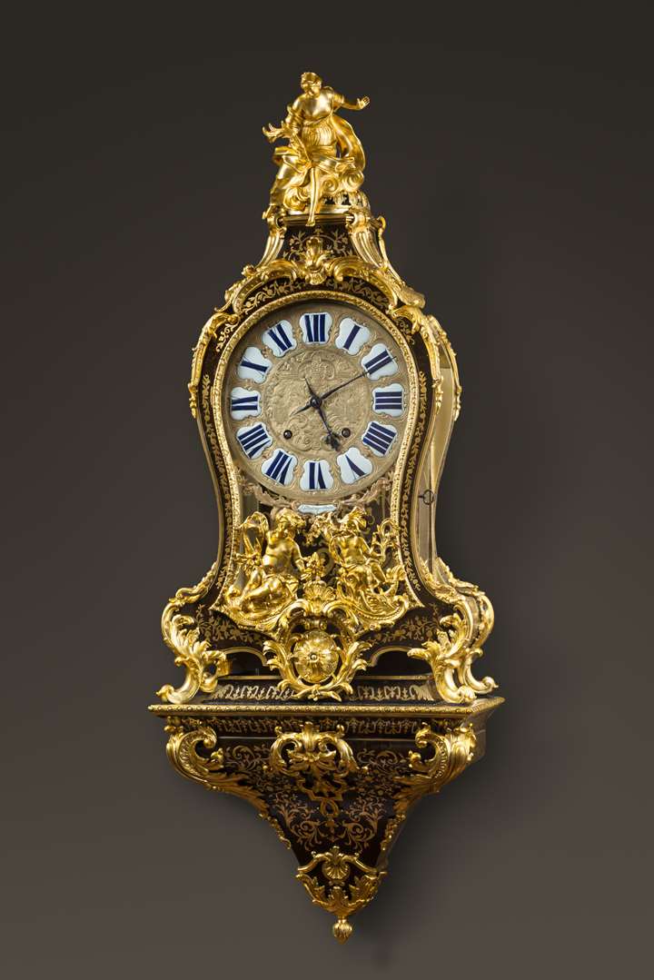 A REGENCE ORMOLU-MOUNTED BOULLE MARQUETRY CARTEL-CLOCK ON BRACKET